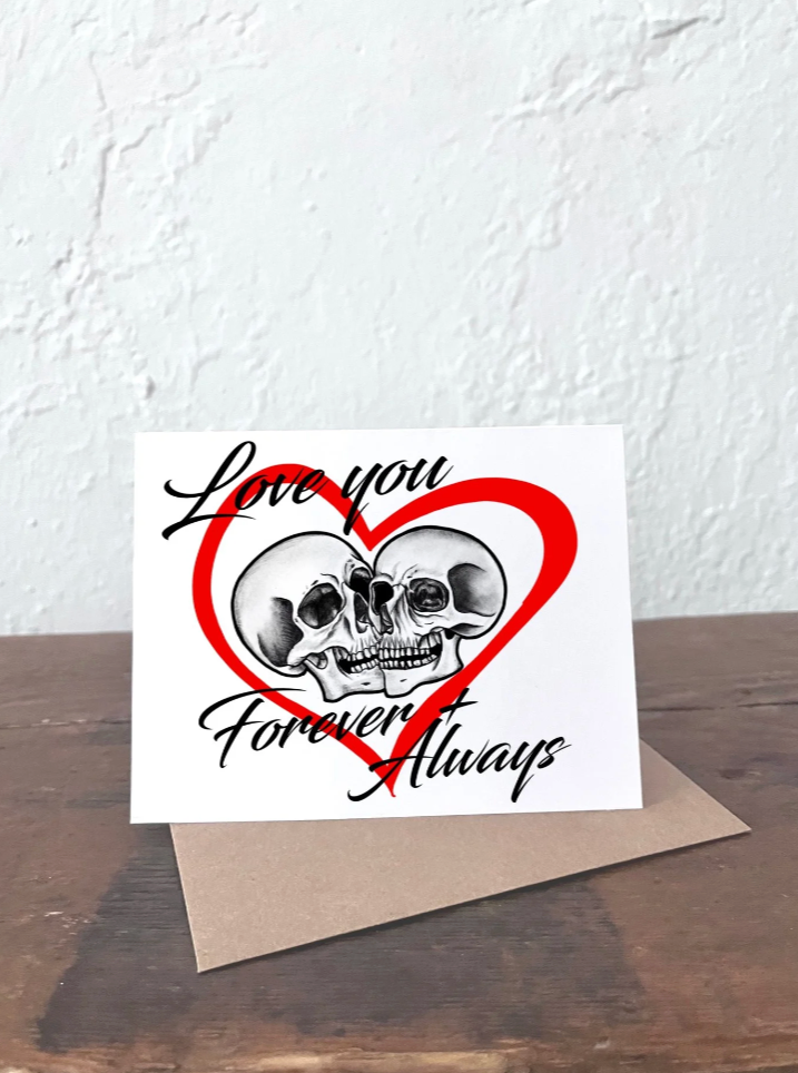 Card with skull design and 'Love you forever always' text on a textured white background