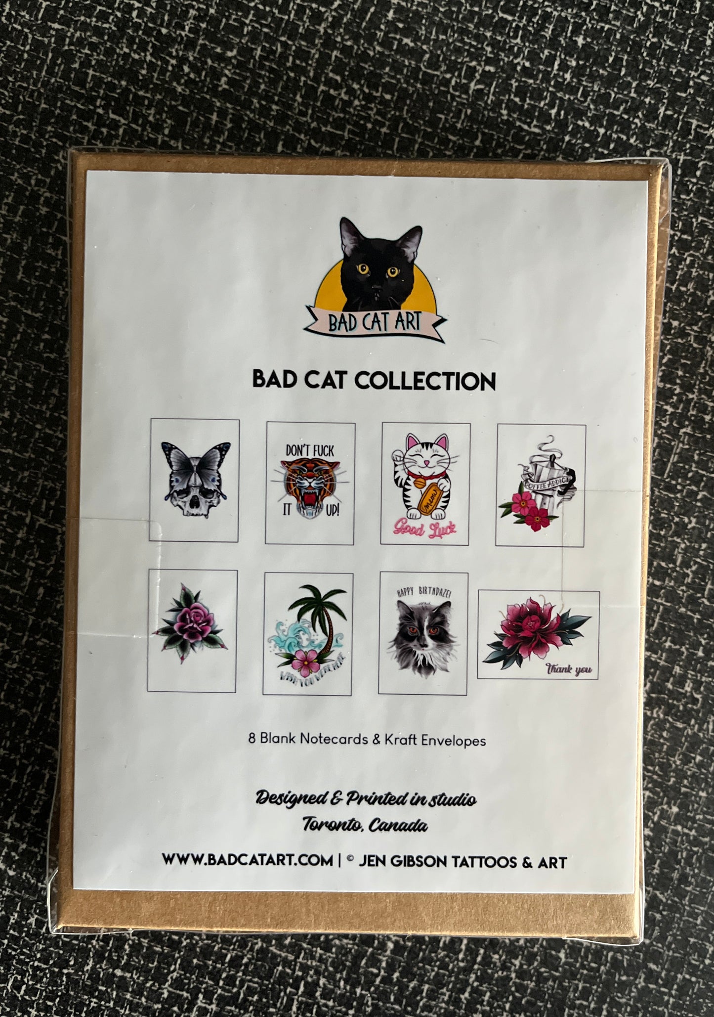 Packaging of Bad Cat Collection card set  on a textured black surface