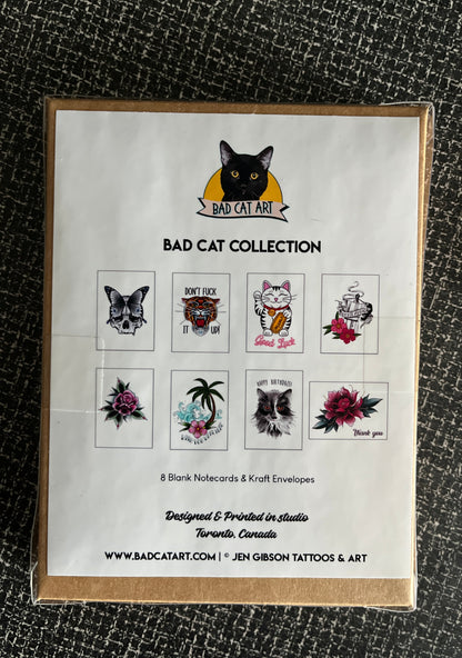Packaging of Bad Cat Collection card set  on a textured black surface