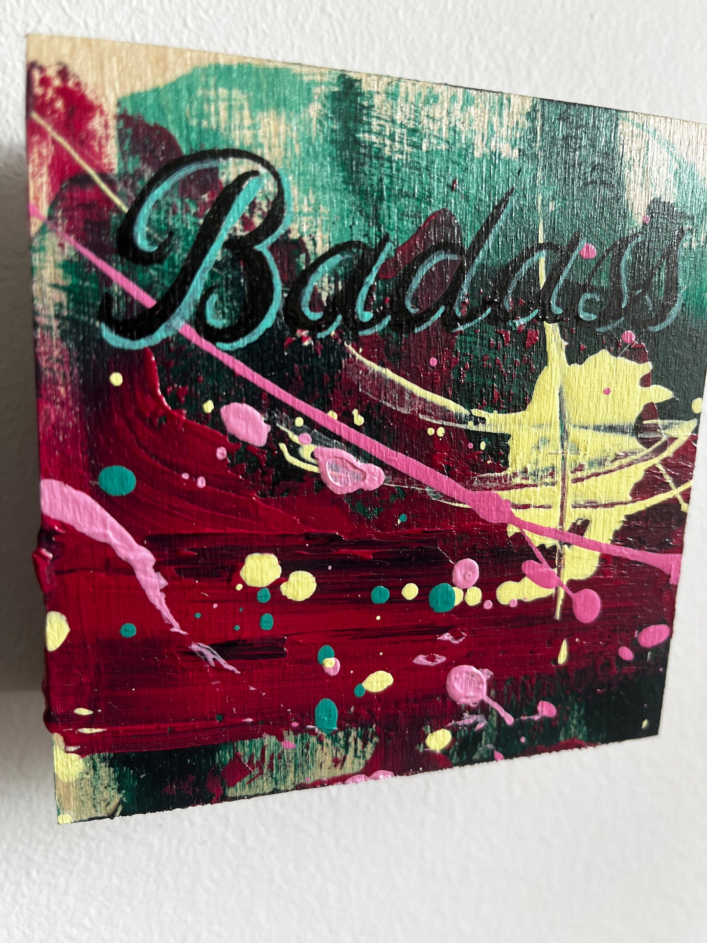 Abstract painting with splashes of color on a white background