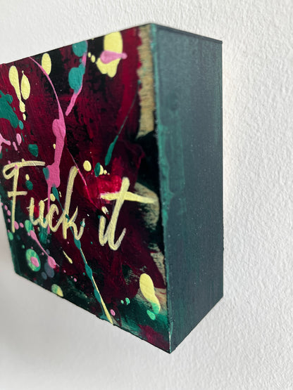 Colorful abstract art block with text on a white background
