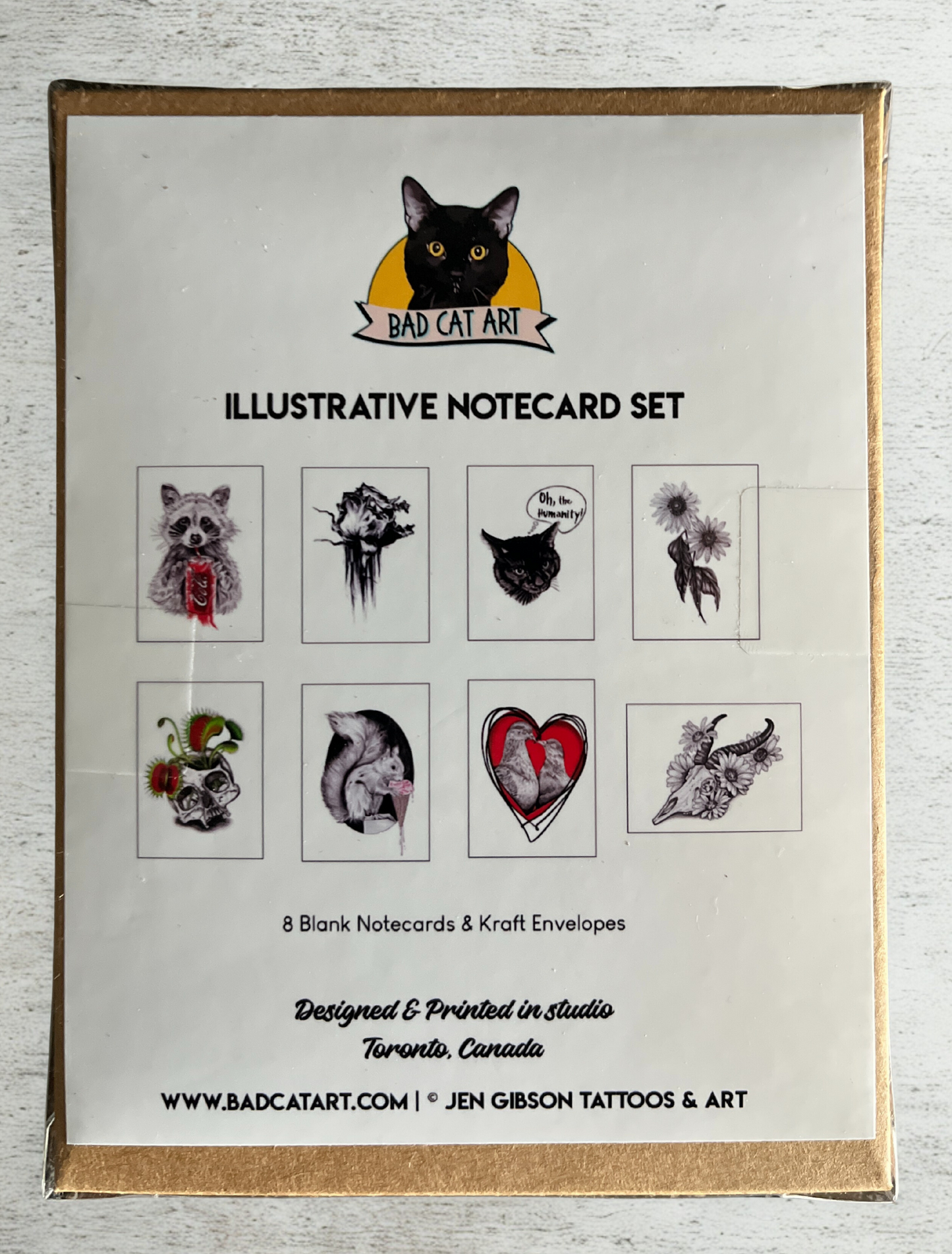 Illustrative notecard set with designs on a white background