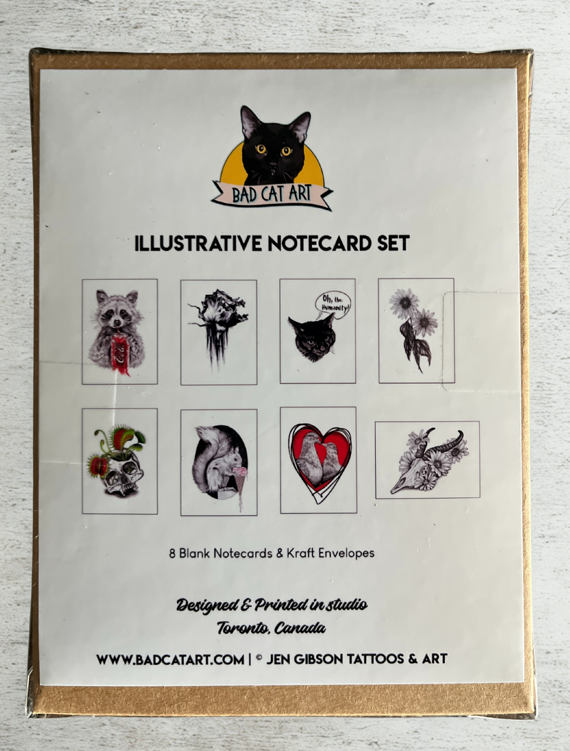 Illustrative notecard set with designs on a white background