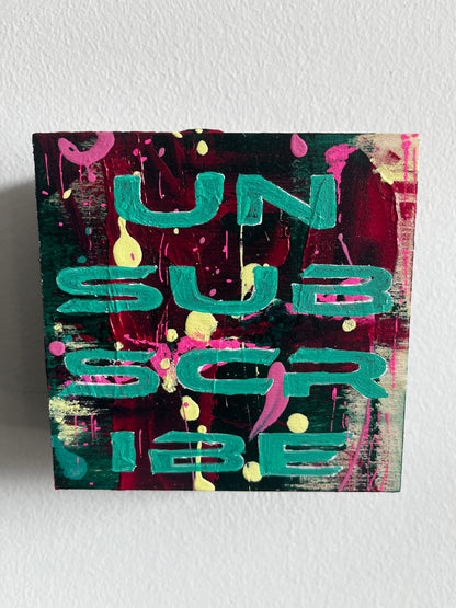 Abstract art piece with colorful letters on a textured white background
