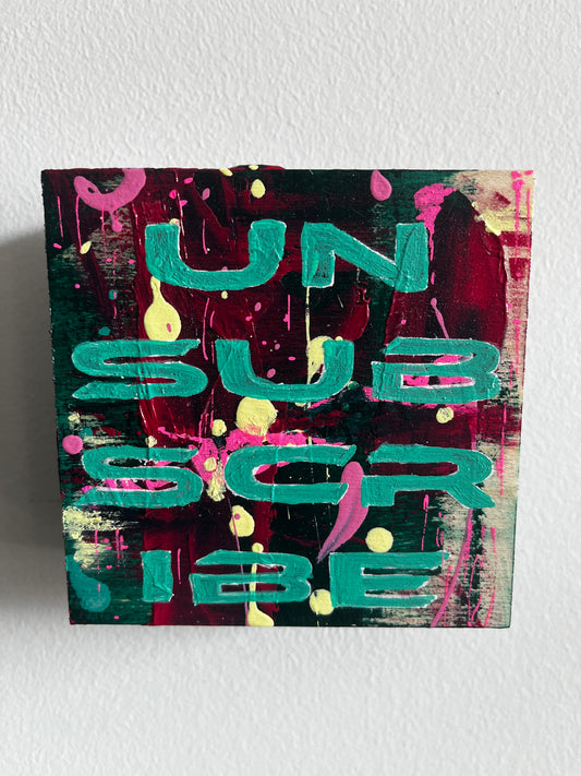 Abstract art piece with colorful letters on a textured white background