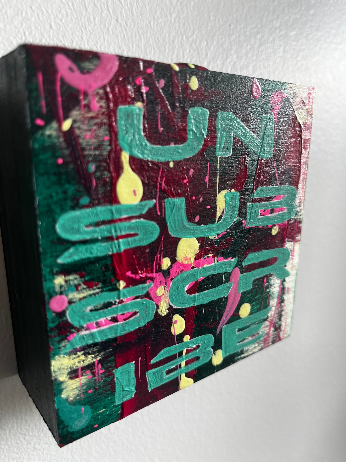 Colorful abstract painting on a textured surface