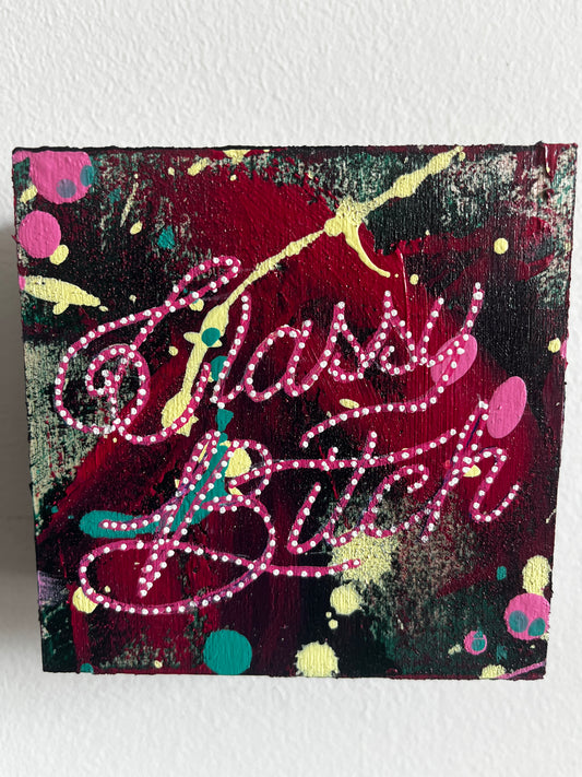 Abstract artwork with colorful patterns on a textured surface
