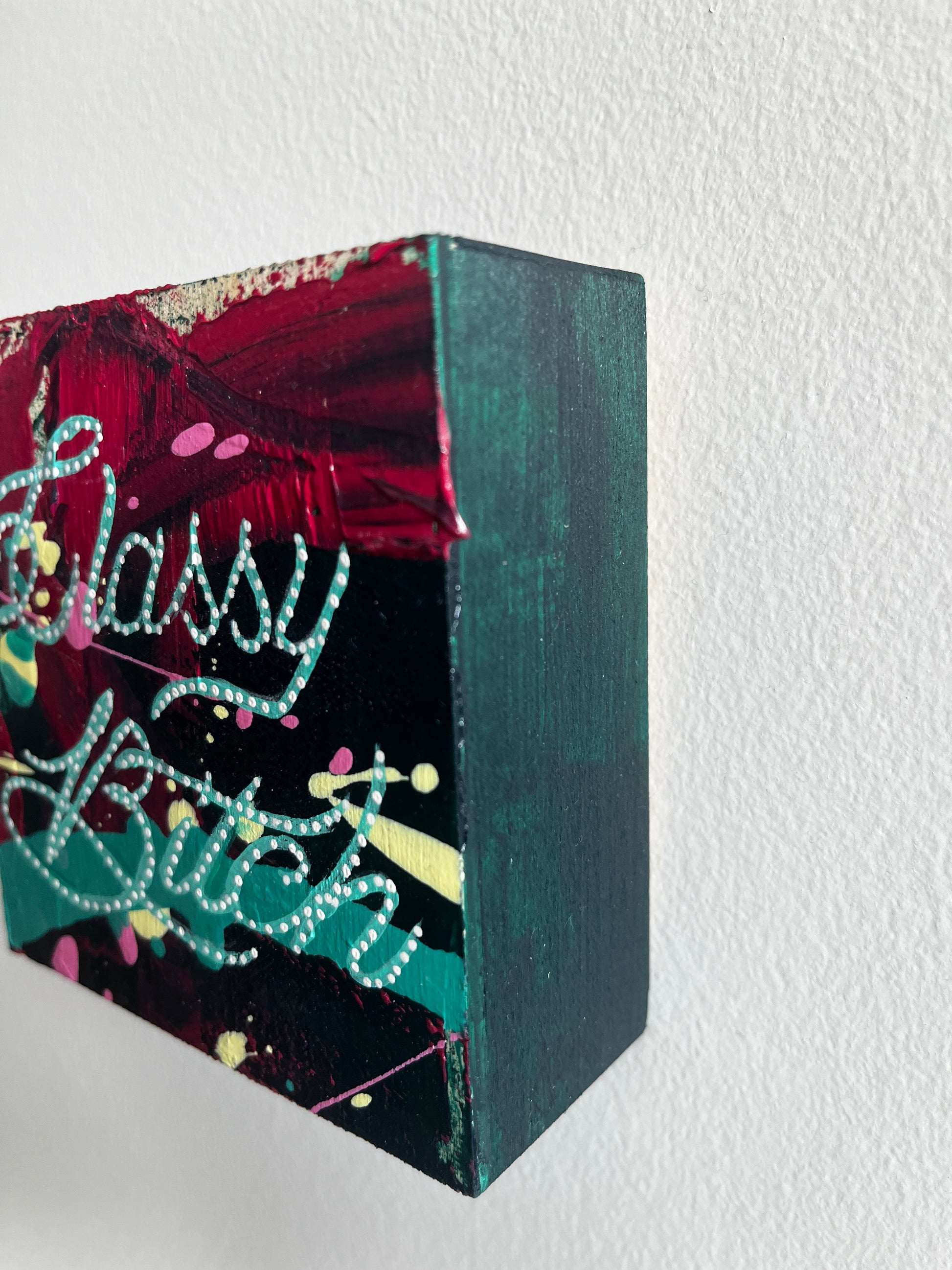 Colorful rectangular box with decorative patterns on a white background
