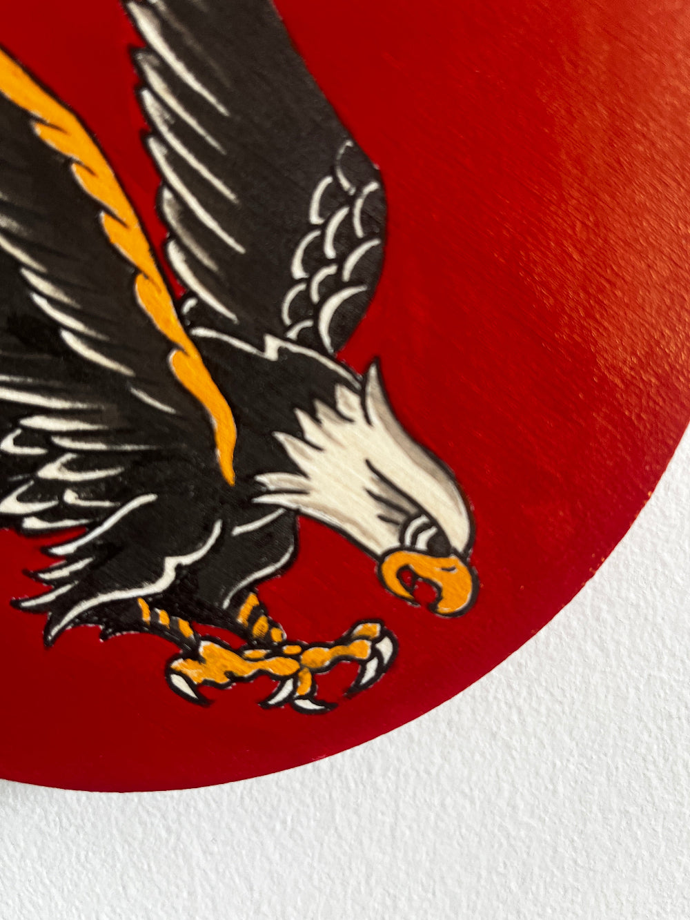 Illustration of an eagle with outstretched wings on a red background