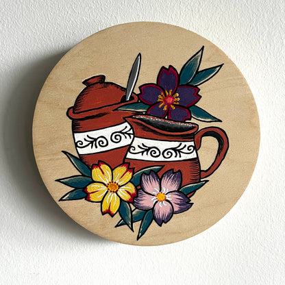 Painting with florals and ceramic creamer and sugar set design on a white background