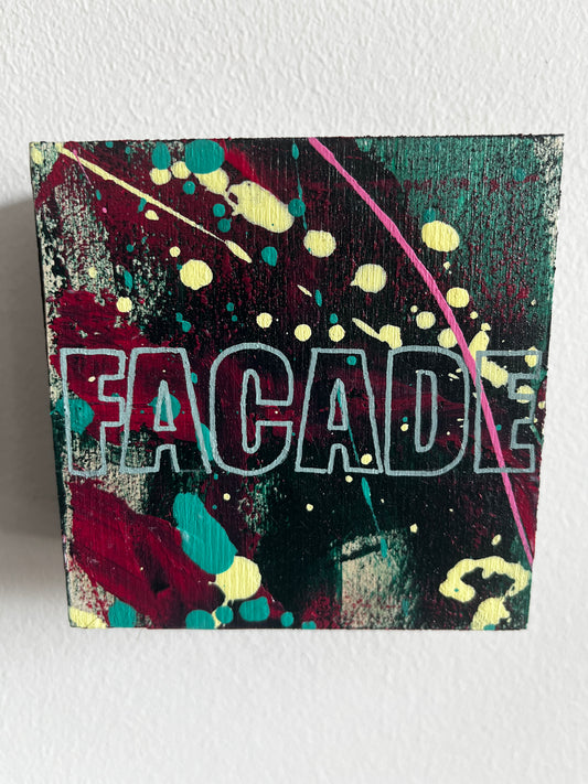 Colorful abstract art piece with 'Facade' text on a white background
