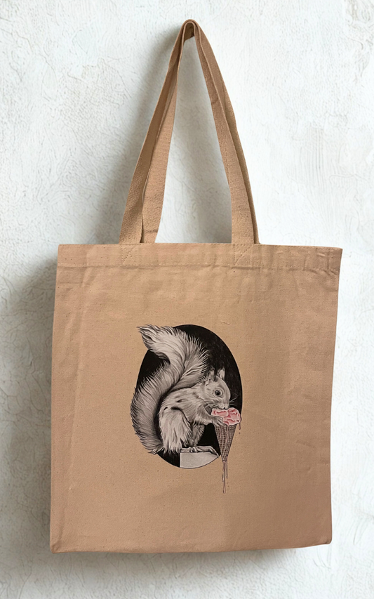 Beige tote bag with a graphic of a squirrel on a textured white background